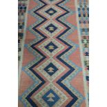 A TURKISH RISHGAI KILIM WOOL RUNNER,