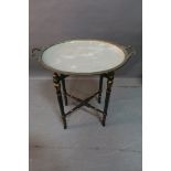 A CONTINENTAL PORCELAIN AND GILT BRASS TRAY,