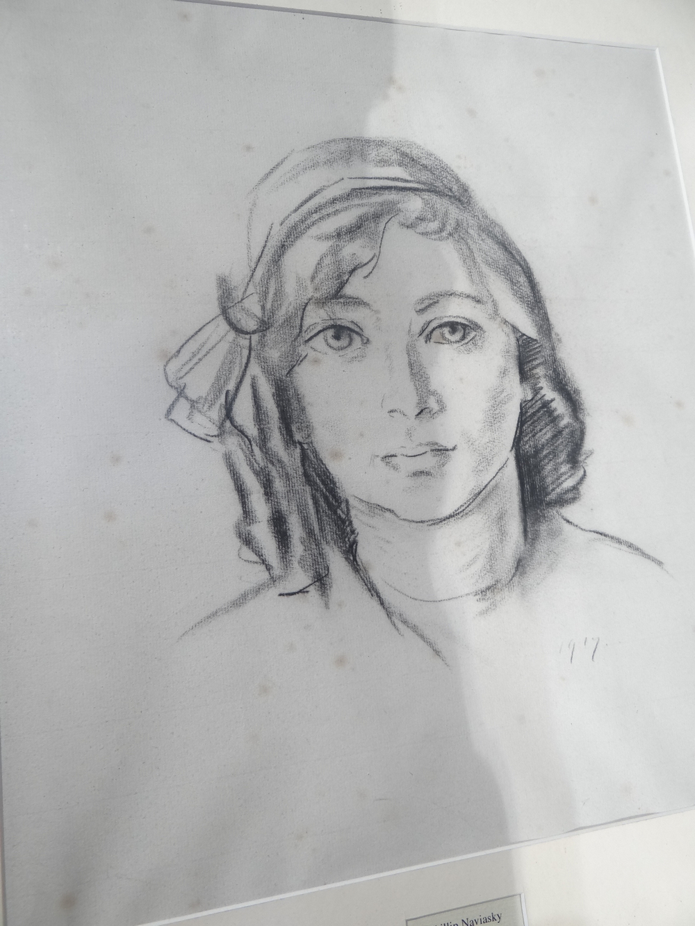 In the style of Phillip Naviasky, Portrait of a girl wearing a scarf, Charcoal monochrome, Dated