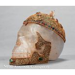 Tibetan or Nepalese Gem Embellished and Gilt Filigree-Mounted Rock Crystal Skull, filigree