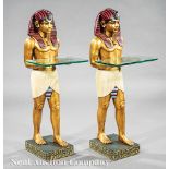 Pair of Egyptian-Style Gilt and Polychrome Painted Figures, Classical pose holding glass trays,