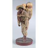 New Orleans Vargas Family Waxwork Figure of a Mexican Gourd Carrier, c. 1880s, well-modeled,