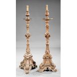 Pair of Italian Baroque-Style Carved Wood Torchères, scrolled standard, tripartite base,