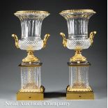 Pair of Louis XVI-Style Gilt Bronze-Mounted Cut Glass Urns on Stands, ram's head handles, h. 20 1/