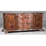 Large Brazilian Carved Jacaranda Credenza, early 19th c., shaped molded top, conforming case