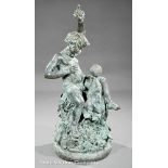 Continental Verdigris Patinated Bronze Figural Fountain, putto and dolphin on foliate and floral