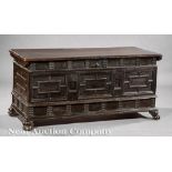 Italian Carved Walnut Cassone, 18th c., molded top, three paneled drawers, paw feet, h. 26 in., w.