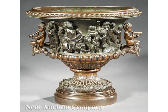 Antique French Patinated Bronze Urn, after Clodion, decorated with cavorting putti, foliate base, h.