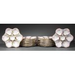 Set of Twelve Haviland & Co. Limoges Gilt-Decorated Porcelain Oyster Plates, c. 1879-1889, all