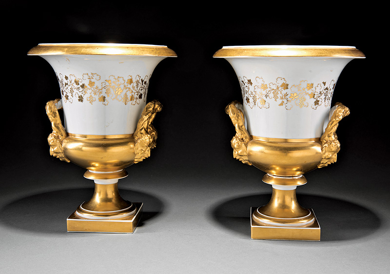 Pair of Paris Porcelain Campagna Urns, mid-19th c., gilt decorated vintage banding, and mascaron