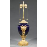 French Bleu du Roi Porcelain and Bronze-Mounted Urn-Form Lamp, 20th c., ram's head handles, h. (to