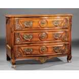 Regence Carved Walnut Serpentine Front Commode, 18th c., bronze urn and Comus mask pulls, urn