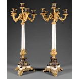 Pair of Louis Philippe Gilt and Patinated Bronze and White Marble Five-Light Candelabra, 19th c.,