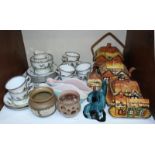 SECTION 11. A Royal Stafford part tea and coffee set with exotic bird scenes, together with a