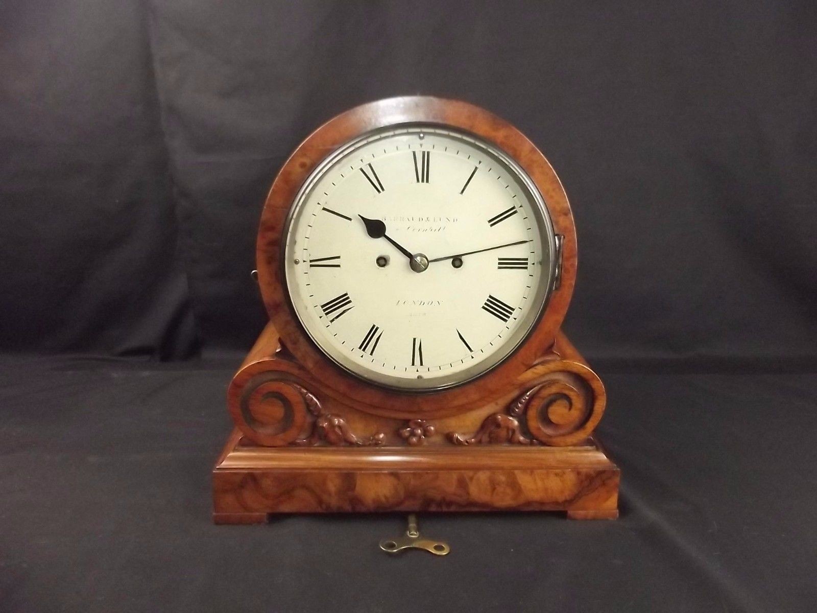 A Victorian walnut bracket clock by Barraud & Lund, The Cornhill, London, with an eight-day twin-