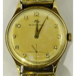 A gents 9ct gold Movado wristwatch, the silvered dial with Arabic numerals denoting hours and