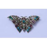 An 18ct gold brooch modelled as a butterfly and set with multiple cabochon opals, turquoise and