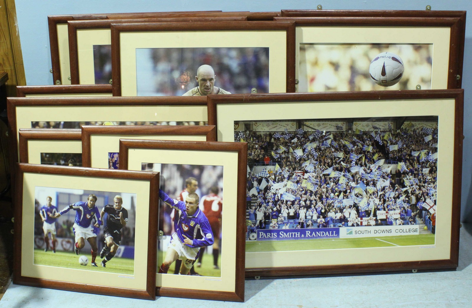 Twelve large framed colour Portsmouth action photo-prints and seven smaller framed photo-prints, all