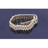 An 18ct gold Rolex style bracelet set with eight hundred diamonds weighing a total of 4.00 carats.
