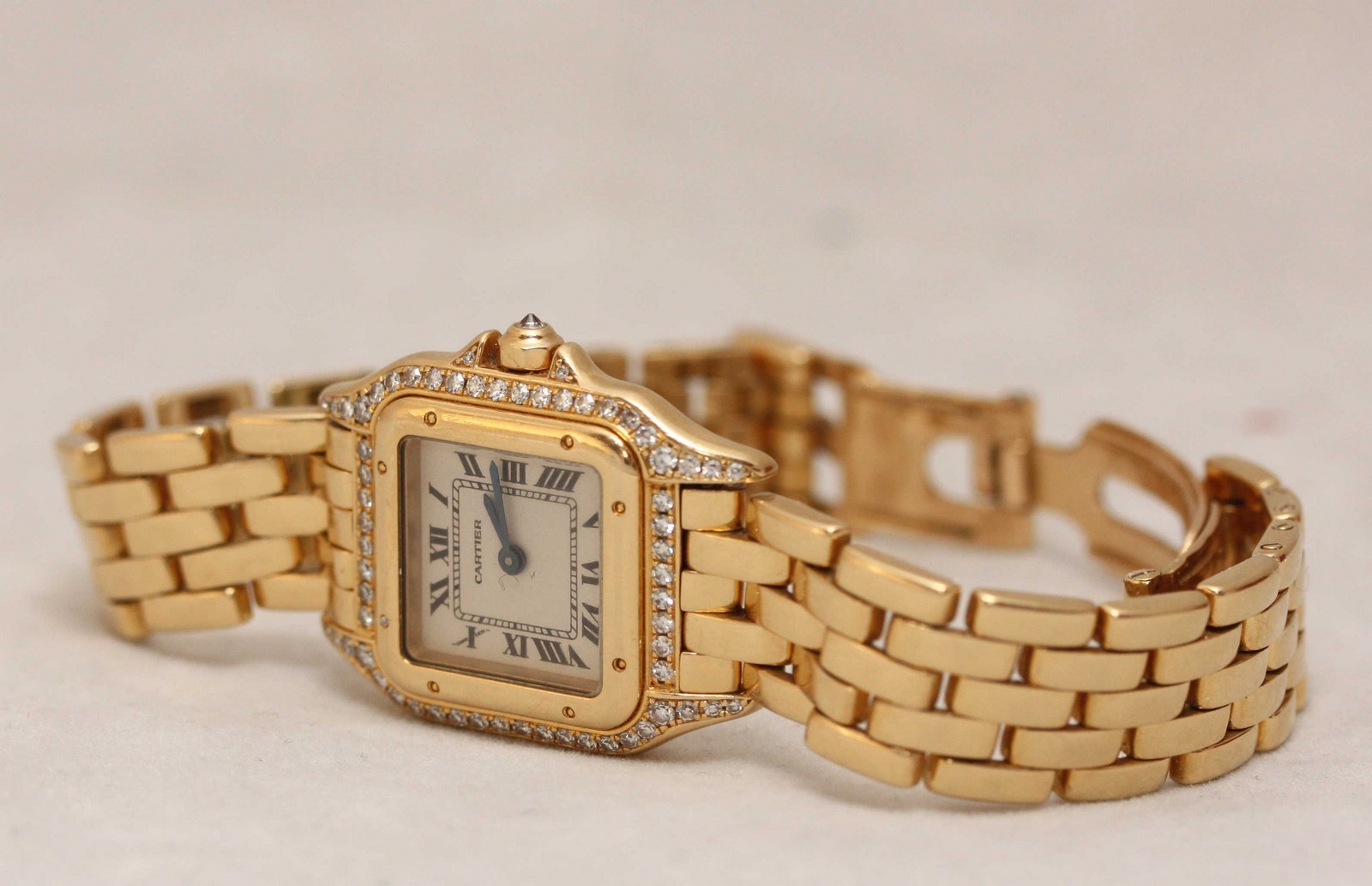 A ladies 18ct yellow gold quartz Panthère de Cartier wristwatch, reference '128 000 M,' The square