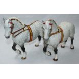 Two Beswick Percheron horses in show harnesses, model No.2464, dappled grey matt. Beswick marks to