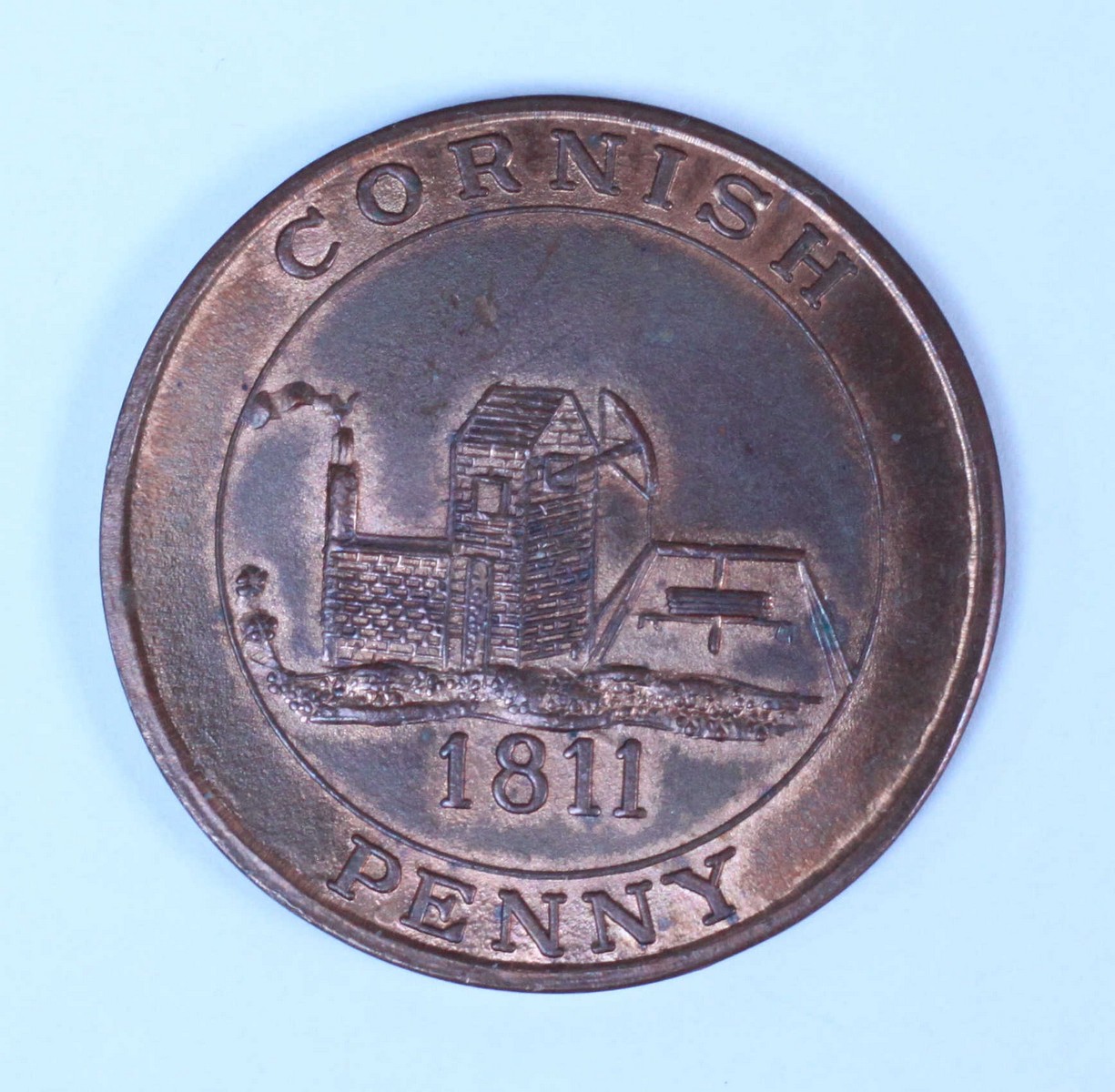 A copy of a Cornish Penny dated 1811, obverse a fish 'For the Accommodation of The County' around, r