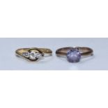 A 9ct gold solitaire Alexandrite ring, 2.33gms, together with an 18ct gold diamond ring, 2.31gms,