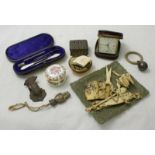 A vintage cased sewing kit together with various bone-carved scissors and spoons and other