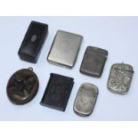 A silver vesta case, together with two white metal vesta cases, white metal stamp case, Edward VII
