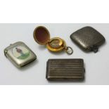 An early 20th century gilt-metal sovereign case, together with a silver vesta case, silver match-