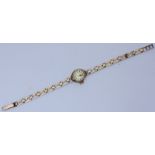 A ladies 9ct gold cocktail watch with bracelet strap, quartz movement, 11.12grams
