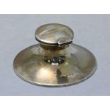 An Edwardian silver capstan inkwell by 'A & J Zimmerman,' of typical form, the hinged lid with pen