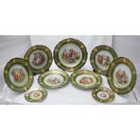 A set of nine Vienna porcelain plates of varying sizes, each decorated with printed figural scenes