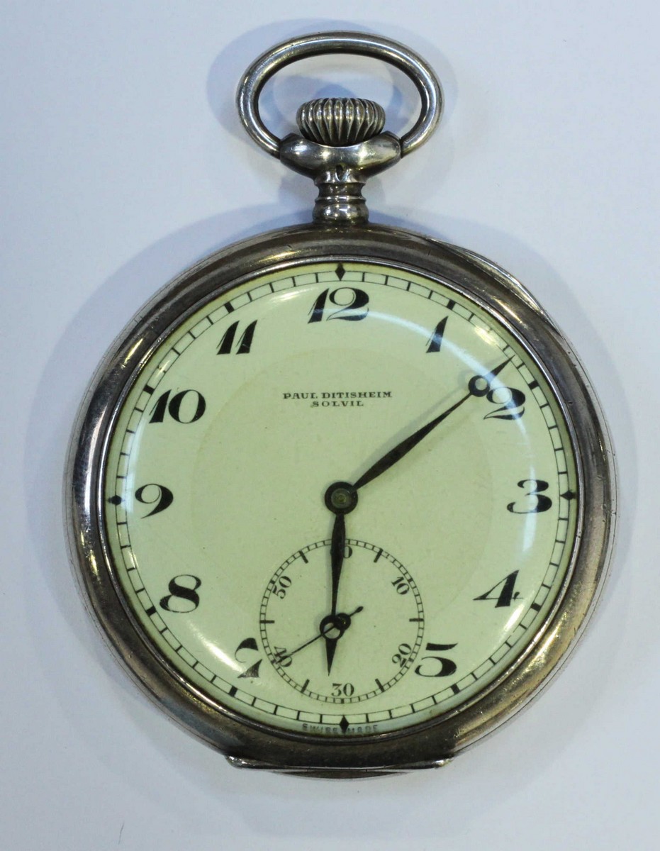 A silver open-faced pocket watch by 'Paul Ditisheim Solvil.' The white dial with Arabic numerals