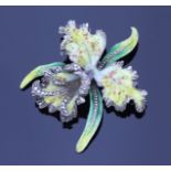 A white metal, enamel and marcasite brooch modelled as an orchid.