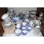 SECTION 31. A quantity of Minton tea and dinner wares including some 'Lyre Flow' pattern examples,