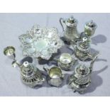 A small quantity of silver-plated wares including teapots, jugs and an ornately worked fruit-bowl