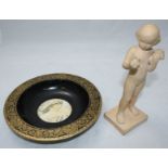 A 1920s continental unglazed terracotta figure of a pre pubescent figure of a girl, stamped to the