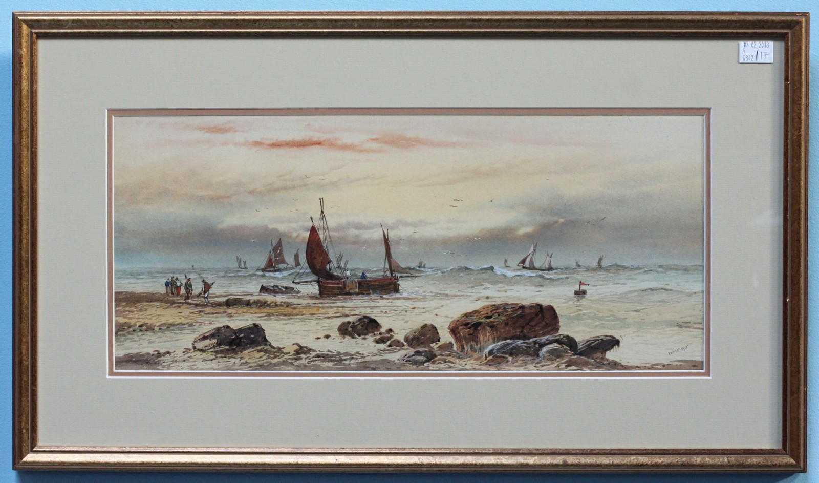 W H Earl? (Early 20th Century) Shoreline scene with figures in the foreground and boats at sea.