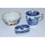 An 18th century New Hall porcelain 'Boy and Butterfly' tea bowl, together with an early 19th century