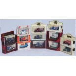 A small collection of thirteen assorted boxed scale model cars including examples by Lledo and