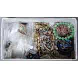 A quantity of costume jewellery including necklaces, vintage and modern bracelets including a