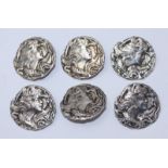 A set of six Art Nouveau silver dress buttons, each embossed with a female in profile with flowing