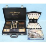 A twelve-place gold plated canteen of cutlery by Solingen, together with a cased set of fish