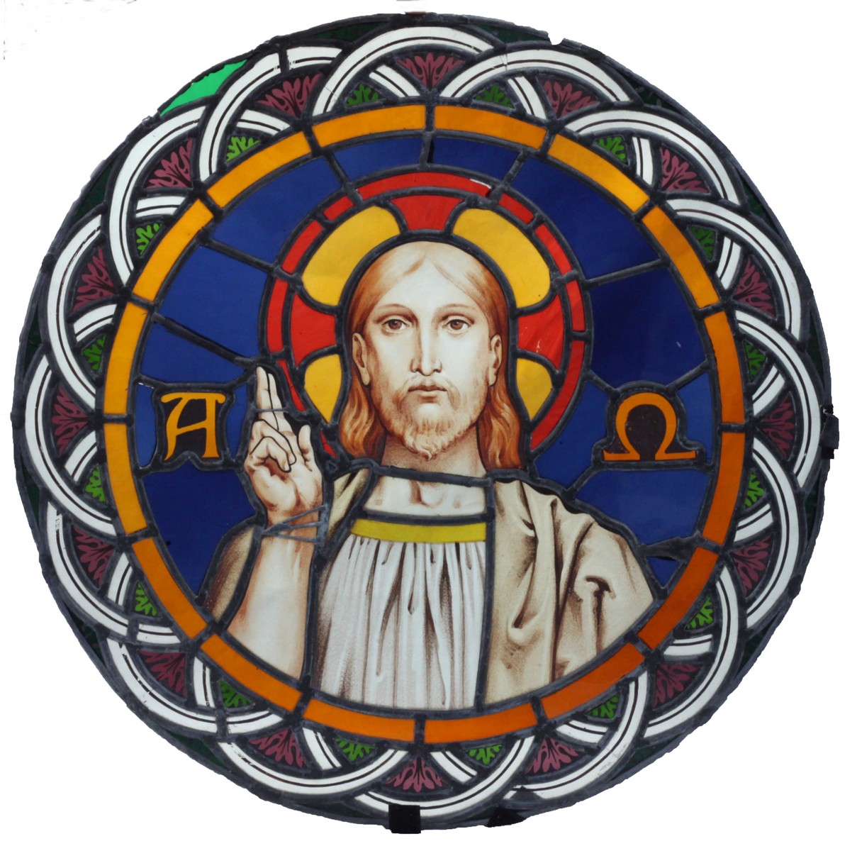 A 19th century stained and lead glazed circular panel, depicting Christ, flanked by Alpha and