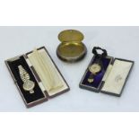 Two various 9ct gold wristwatches, together with a silver circular lidded snuff box.