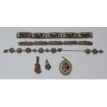 A small collection of assorted micro-mosaic jewellery items including bracelets and brooches etc.