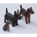 A cold-painted solid cast bronze figure of a Lakeland terrier, together with a larger cold painted