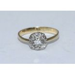 An 18ct gold and diamond cluster ring, estimated diamond weight approximately 0.33cts. Gross
