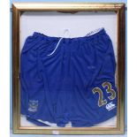 A framed pair of Sol Campbell match-worn No.23 Portsmouth shorts, with Pompey crest and Canterbury